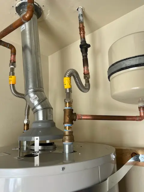 Water heater installation and plumbing repair in Girvin